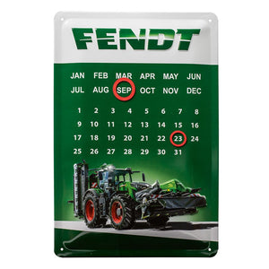 A green and white AGCO Fendt sheet metal calendar featuring a nostalgic accessory: a tractor image at the bottom and the brand name "Fendt" at the top. The months and days are listed, with magnetic circles highlighting important dates, including September 23 circled in red.