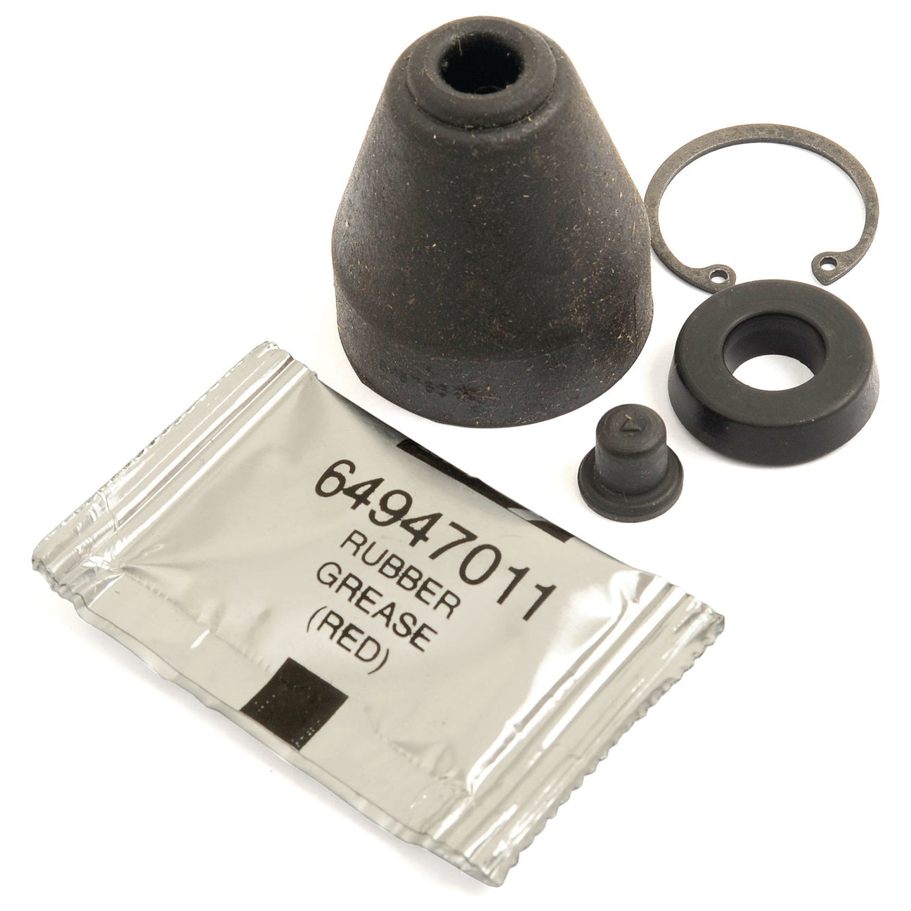 The Sparex Brake Slave Cylinder Repair Kit (Sparex Part No.S.102692) includes a packet labeled "RUBBER GREASE (RED)" and four black rubber components of various shapes and sizes placed nearby, ideal for servicing a Matbro brake slave cylinder.