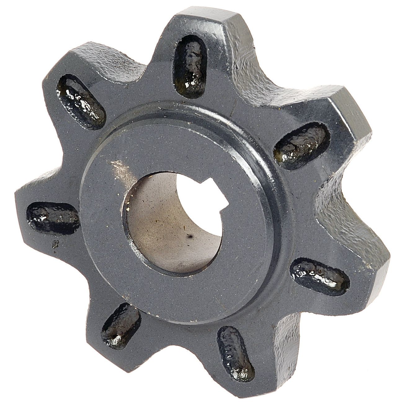 Close-up image of a metal sprocket with six teeth and a central hole, identified as Sparex Part No. S.104669 (Product Name: Sprocket To fit as 678856). The sprocket, commonly used in Claas LEXION machinery, appears industrial-grade and shows slight wear and tear.