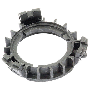 A black, circular plastic component with notches, ridges, and multiple protruding tabs around its perimeter, ideal for use in a PAK-PTO BEARINGS ECO-MEDIUM (Sparex Part No.S.10471) by Sparex.