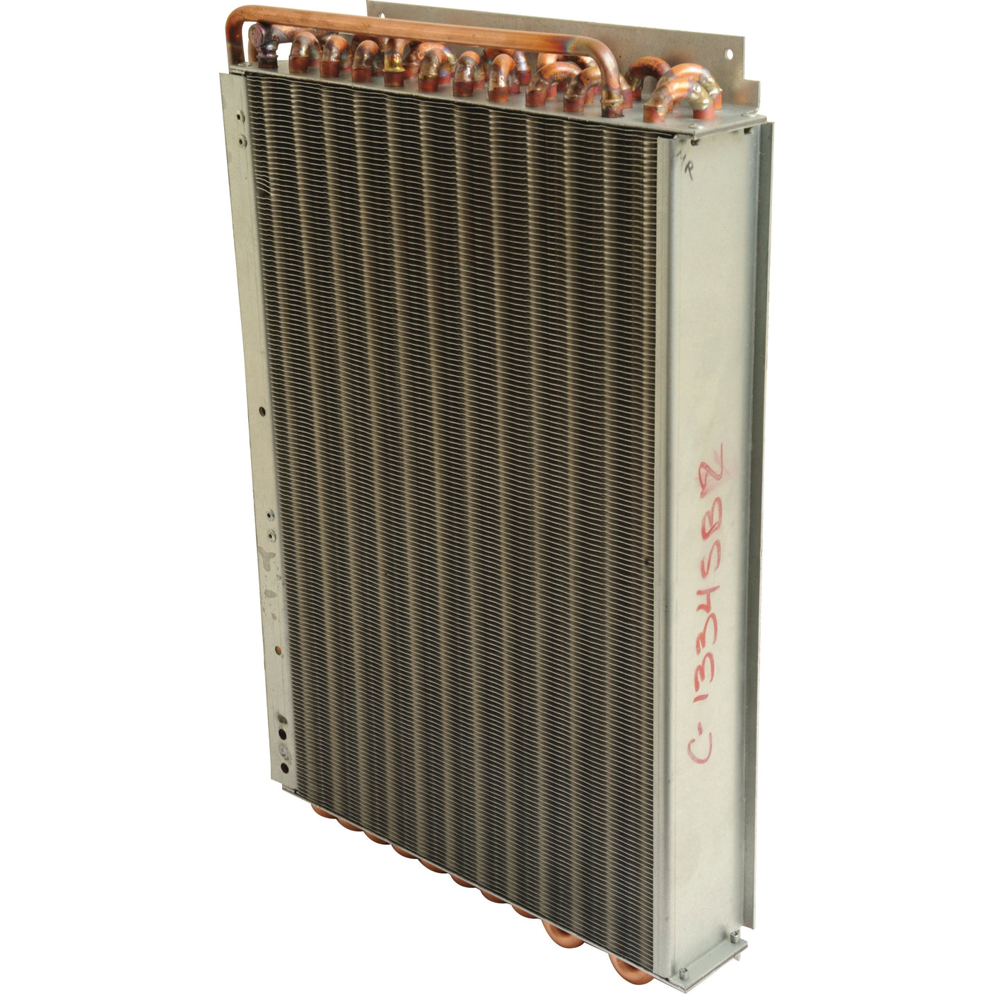 The Condenser - S.106671 by Sparex is a vertical rectangular metal heat exchanger featuring stacked fins and multiple copper tubing loops at both the top and bottom edges. The side panel includes a handwritten marking. It is compatible with Case IH machinery for efficient performance.