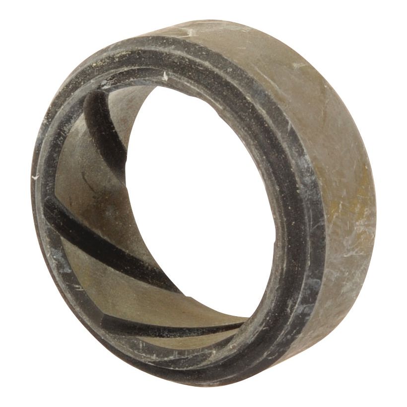 A close-up view of a round, metal bearing with a grooved inner surface, showing signs of usage and wear, resembling the durability seen in Sparex Upper Kingpin Bush (Sparex Part No.S.107241).