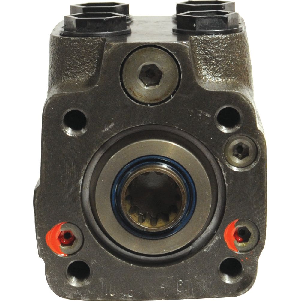 Close-up of the Orbital Steering Unit (Sparex Part No. S.107450), a metallic mechanical component with several bolts and a central circular part featuring a seal, reminiscent of the precision seen in Case IH machinery.