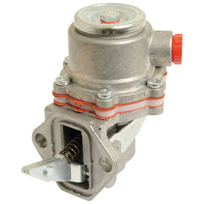 A close-up image of the Sparex Fuel Lift Pump (Part No. S.107984), a metal mechanical component with bolts and an exposed spring mechanism, compatible with Ford New Holland and Case IH equipment.