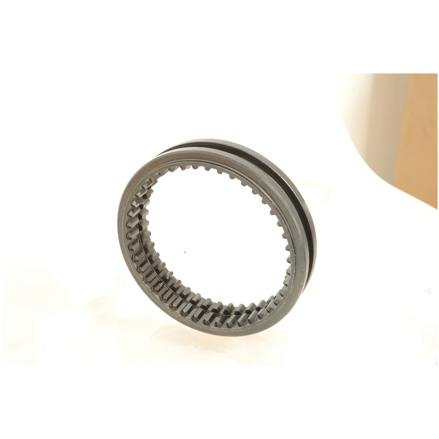 A Sparex Transmission Gear (Part No. S.108259) is a metal ring-shaped mechanical part featuring internal teeth and a groove on the outer surface, placed against a light background, and suitable for Fiat 115-90 applications.