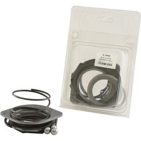 Displayed next to its packaging, the 8-piece Sparex SLIP CLUTCH REPAIR KIT (N/L) | Sparex Part No.S.10846 includes essential components such as a spring, metal discs, and balls. Ideal spares for repairing slip clutches.