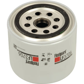 The Sparex Oil Filter - Spin On - LF3706 (Sparex Part No. S.109438), designed for Kubota engines, features a cylindrical shape with a white exterior, metal center, and multiple holes at the top for optimal oil flow.