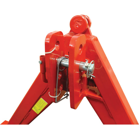 Close-up of the A Frame Quick Hitch System (Cat.1) CE Approved - S.110168 by Sparex, showcasing its heavy-duty red metal hinge mechanism with pins and bolts, used in large machinery or equipment. Load capacity: 1200Kg.