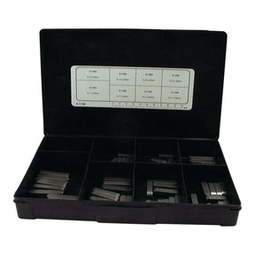 The Sparex Metric Parallel Keys Assortment (Handipak, 80 pcs, Part No. S.11160) comes in a black case with compartments for various-sized rectangular metal pieces. The inside of the lid features a white label listing different measurements according to DIN 6885A Metric Parallel Key standards.