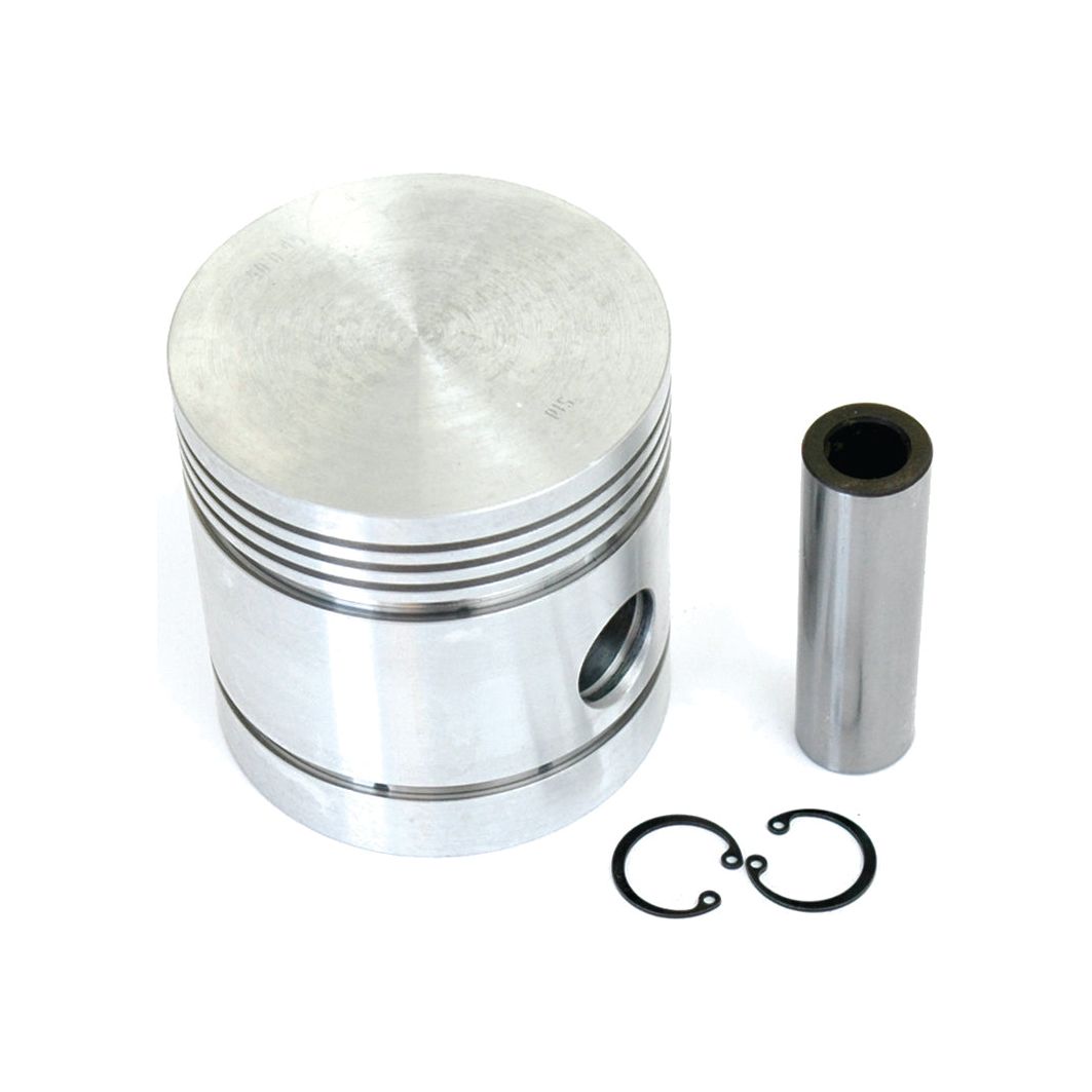 A Sparex Piston (Standard) - S.118350, featuring several grooves, accompanied by a cylindrical pin and two circular clips, is placed on a white background, evoking the robust engineering typical of Massey Ferguson machinery.