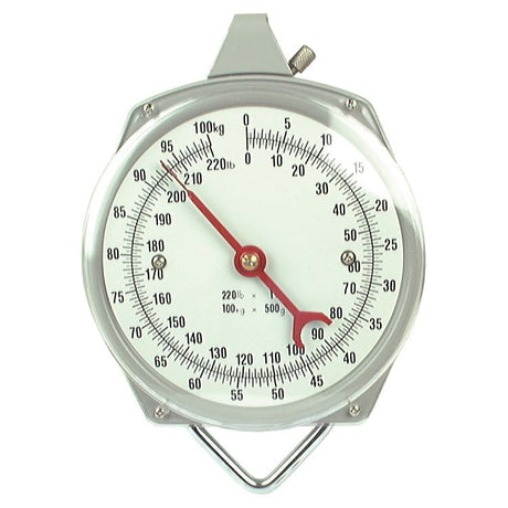 The Sparex SCALE-100KG/500G 220LB/1LB - S.12439 is a robust silver analog hanging scale that features a spring balance mechanism, displaying weights in both kilograms and pounds, with a red needle pointing to approximately 80 kilograms.