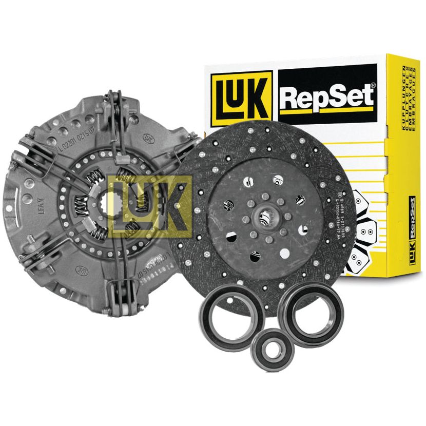 A Sparex Clutch Kit with Bearings - S.137830, featuring a pressure plate, an organic captive disc, a release bearing, and a pilot bearing, is displayed next to its branded packaging.