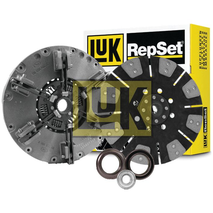 The Clutch Kit with Bearings - S.147311 by Sparex, which includes a Cerametallic Disc, pressure plate, and bearings, is displayed in front of a yellow and black box featuring the Sparex brand logo.