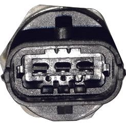 Close-up of a rectangular automotive electrical connector with multiple metal pins inside, akin to the ones used in Case IH MAXXUM tractors' Fuel Rail Pressure Sensor, specifically the Sparex Fuel Rail Pressure Sensor (Sparex Part No. S.151194).