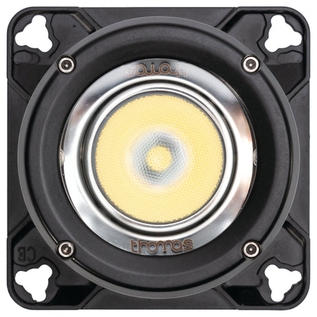 Close-up view of the Sparex LED Work Light (Cree High Power), square-shaped with a circular lens in the center, mounted on a black frame with four screw holes at the corners. Boasting an IP68 rating and 5700K brightness, it's built for durability and superior illumination. This Class 3 interference light delivers 3000 Lumens Raw, operating between 10-36V.
