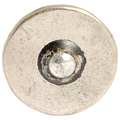 Close-up image of a silver metallic button with a slightly tarnished surface, resembling the Sparex Part No. S.153718 Light Bulb (Halogen), 12V, 50W, BA20s (Blisterpak 1 pc.).