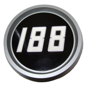 A circular emblem with a gray border and a black background, showcasing the number "188" in white font, reminiscent of the AGCO Massey Ferguson 188 Bonnet Medallion (part number: 1808270M1).