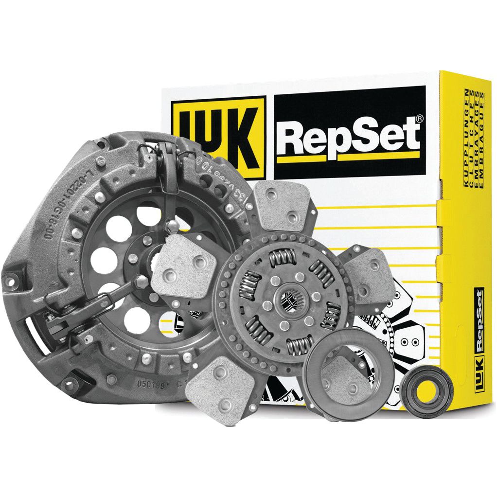 The Sparex Clutch Kit with Bearings - S.162666 includes a clutch pressure plate, clutch disc, release bearing, and installation sleeve. The components are precisely arranged in front of the branded packaging box to highlight their quality and reliability.