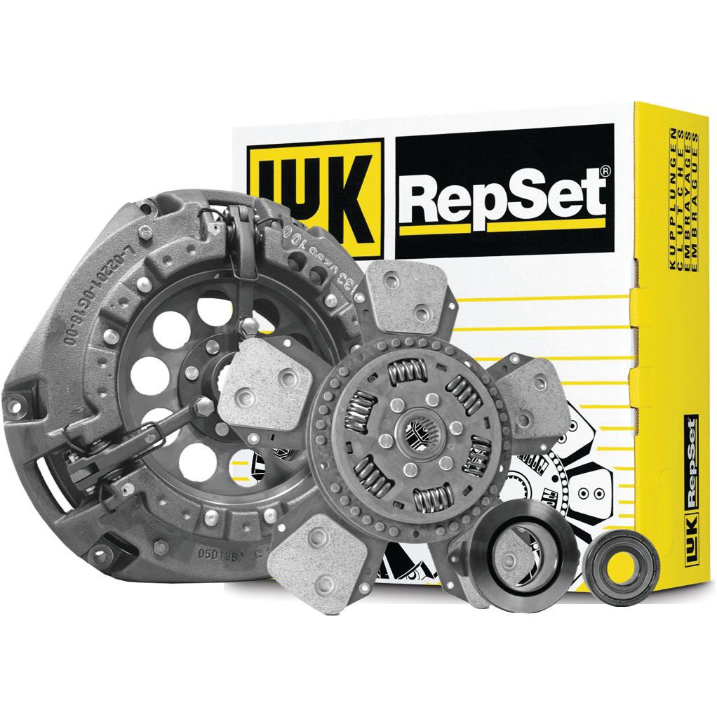 Image of an automotive clutch kit by Sparex, featuring a clutch disc, pressure plate, release bearing, and a yellow and black Sparex-branded box in the background. The product is identified as Clutch Kit with Bearings - S.162667.