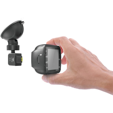 A hand is holding a small black Full HD (1920 x 1080) 2.7'' Sparex Dash Camera - S.163024 with a screen, showcasing its built-in GPS. Another component with a suction cup and connector is positioned separately.