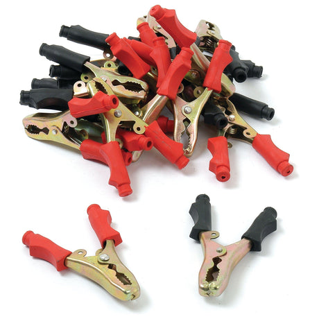 A pile of Sparex Booster Cable Handles 40A (Bag 20 pcs.), with two separated in the foreground—one red, one black—reminiscent of insulated alligator clips.