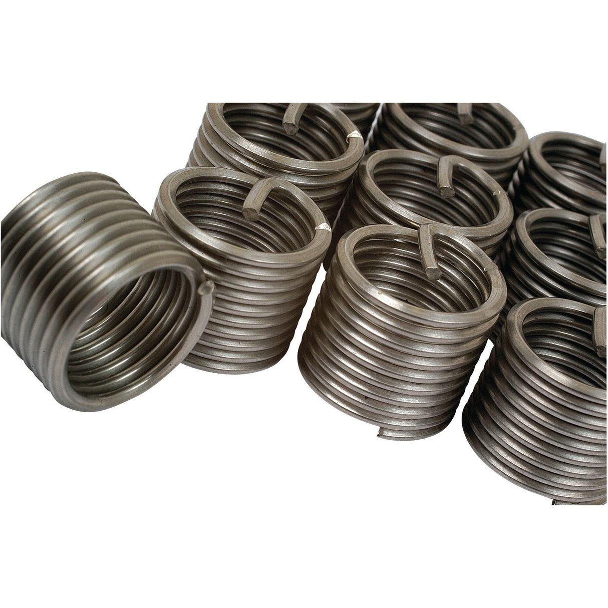 A group of coiled metal springs arranged closely together on a white background, alongside the 12.25mm Drill and the Bag - 10 Inserts Metric Medium 12 x 1.50 with Sparex Part No.S.19984 from Sparex.