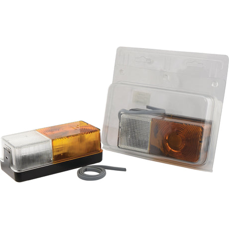 A rectangular Sparex Front Combination Light (Halogen), 12V, RH & LH, Straight - S.20148 with amber and clear sections, functioning as a position indicator, is displayed alongside its packaged counterpart against a plain white background.