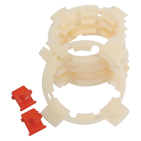 Two white plastic circular spacers and two small red plastic clips on a white background, compatible with the Sparex EASYLOCK BEARING PACK - LARGE (Sparex Part No. S.20537).