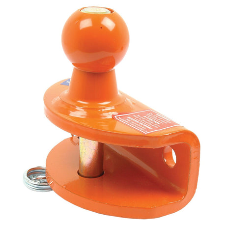 Close-up of the Sparex Double Duty Ball Hitch 50mm (Orange) - S.2061, featuring a securing pin, and a safety sticker attached, ideal for standard duty use up to 3300lbs.