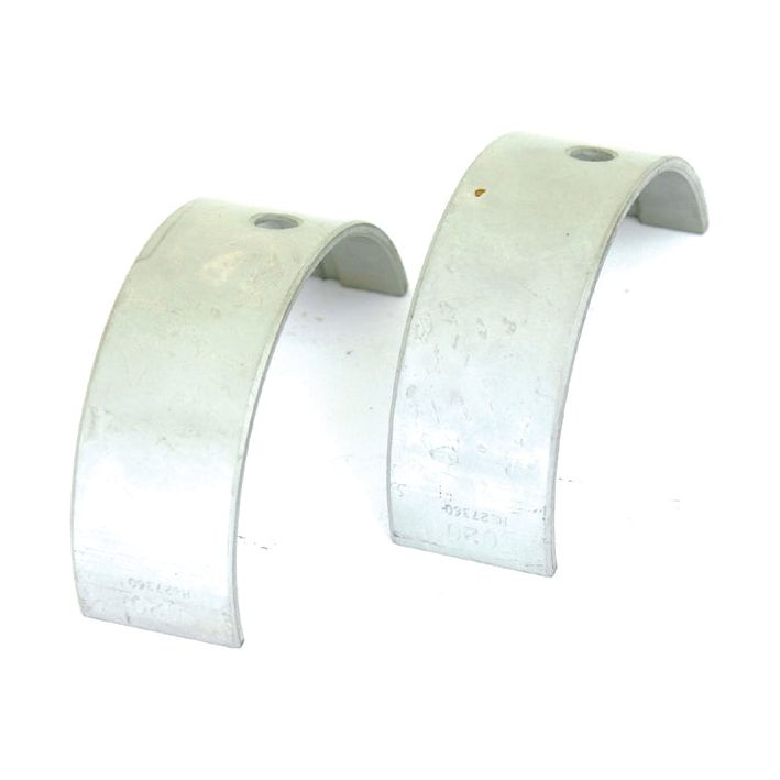 Two curved metal brackets with mounting holes, compatible with John Deere machinery (Main Bearing +0.020'' (0.50mm) Pair - Sparex Part No. S.20803).