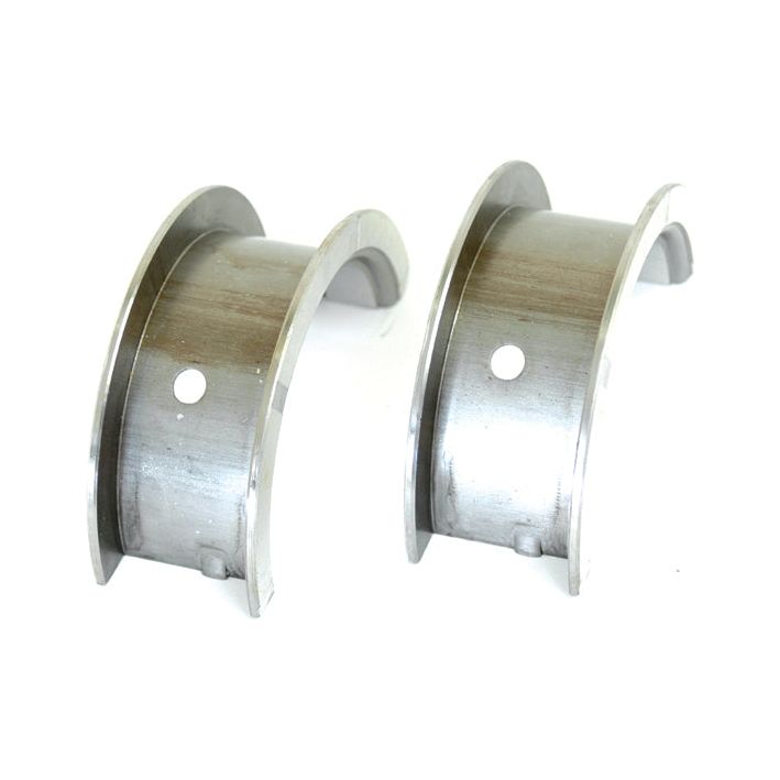 Two curved, metal components with circular holes, positioned parallel to each other, likely to be Main Bearing Std. (Pair) for John Deere engine bearings by Sparex, Part No. S.20941.