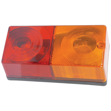 A Sparex Rear Combination Light (Halogen) with four functions: brake, tail, indicator, and number plate. The light features a red lens for brake/tail/indicator functions on the left and an amber lens on the right; both sections are equipped with 12V halogen bulbs.