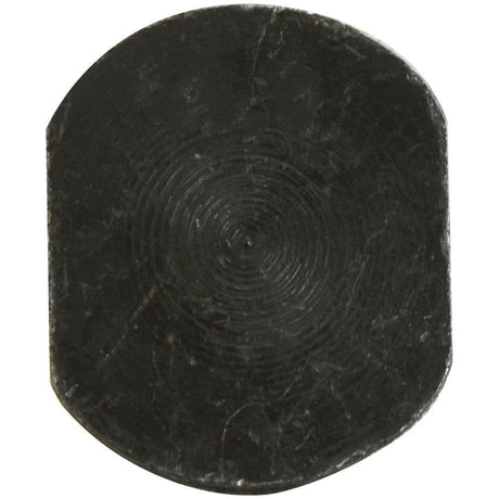 A black hockey puck with visible scratches and scuff marks on its surface, reminiscent of a well-used Sparex Rectangular Head Bolt With Nut (TRCC) - M12 x 90mm, Tensile Strength 12.9.