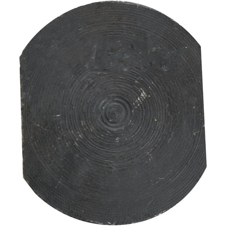 A black circular rubber disk with concentric lines and some illegible text embossed on the surface, reminiscent of the precision seen in a Sparex Rectangular Head Bolt With Nut (TRCC) - M12 x 60mm, Tensile strength 12.9.