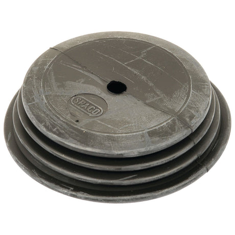 A round, grooved, grey rubber diaphragm with a central hole and the brand name "Sparex" embossed on its surface, suitable for MAJOR models of Ford / New Holland equipment (Fuel Pump Diaphragm | Sparex Part No. S.22484).