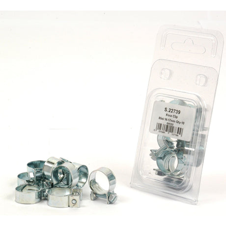 A collection of metal hose clips sits next to a plastic package labeled "Sparex S.22739 Mini Hose Clip, Min Ø14mm, Max Ø17mm, 10 pcs. Agripak," perfect for any small-scale project.