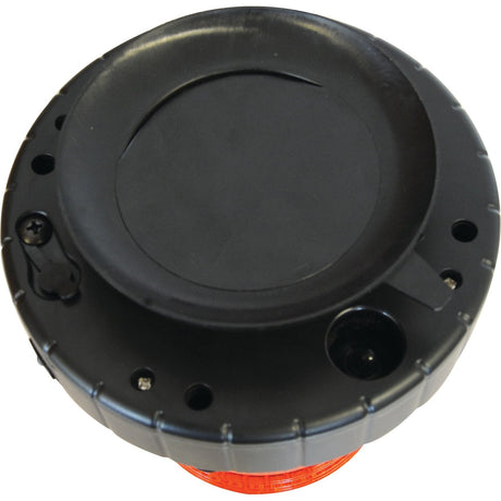 A top view of the LED Rechargeable Beacon (Amber) by Sparex NLA showcasing its black, round design with a red circular base, multiple connectors and screws visible on its surface, and an integrated LED light.