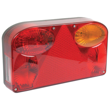 The Halogen Rear Combination Light 12V, RH UK - S.24627 from Sparex is a rectangular trailer tail light assembly that incorporates red, amber, and clear lens sections. It features a central triangular red reflector constructed from reinforced polycarbonate to enhance durability.