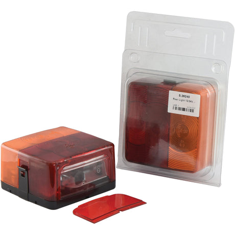 Introducing the Halogen Rear Light 12/24V (Product Code: S.26240) by Sparex, designed for outstanding durability and performance. This set includes two rear vehicle lights with red and amber polycarbonate lenses. One light comes unpacked but includes a plastic cover, while the other is housed in clear packaging. Both lights utilize a halogen light source to ensure optimal visibility and reliability.