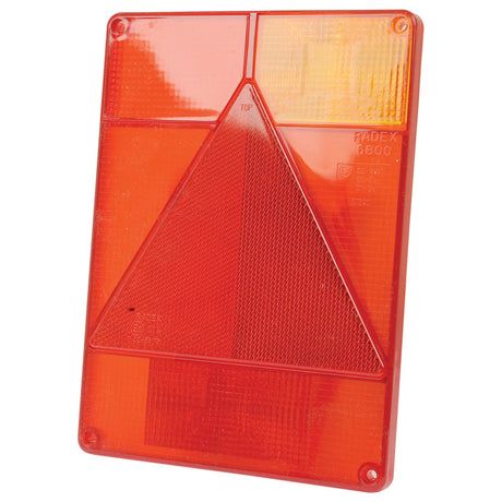 The Replacement Lens, Part No. S.26656 by Sparex, is a high-quality rectangular reflector in red and orange with a triangular prism pattern in the center, featuring small text indicating "Radex" and "6600." Made from durable polycarbonate, this lens is also compatible with Sparex products S.26650, S.26652, and S.26654.