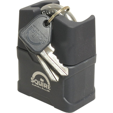 A Squire Stronglock Pin Tumbler Padlock - Steel (S.26755) with a 51mm body width and a security rating of 6 from Sparex is shown. It features a heavy-duty pin tumbler mechanism, comes with two keys attached to a keyring, has a solid black casing, and the Squire logo is prominently printed on it.