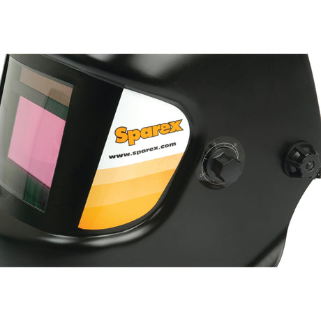 The Electronic Welding Mask - S.27358 by Sparex is a black helmet with a dark visor and the Sparex logo prominently displayed on the front. It includes a clear view filter for precision work and provides UV/IR protection. Additionally, it features an adjustment dial on the right side for personalized fitting.