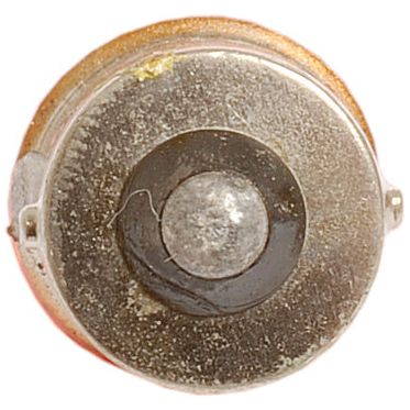 Close-up of the bottom of a Sparex Light Bulb (Halogen) P21W, 12V, 21W with a BA15s base, showing a round central feature that appears slightly corroded and worn.