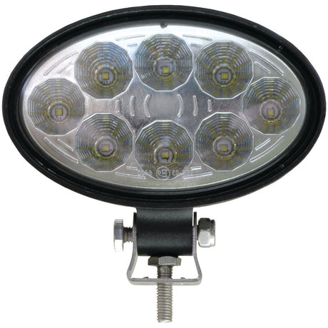 Introducing the Sparex LED Work Light, a versatile and powerful lighting solution with an oval shape and eight circular light modules at its center. Emitting 2400 lumens of raw light, it operates within a voltage range of 10-30V and is classified under Interference Class 3. This work light is mounted on an adjustable bracket for ease of use across various tasks. For detailed product specifications and manufacturer information, please refer to the user manual (Product Code: S.28767).