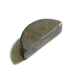 A semi-circular, metallic object with a flat edge reminiscent of an Imperial Woodruff Key 1/8'' x 1/2'' (DIN 6888), casting a distinct shadow on the surface.