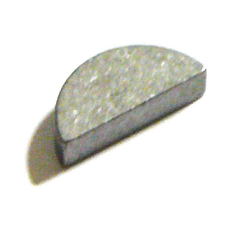 A small, semi-circular  Imperial Woodruff Key 1/4'' x 1'' (Sparex Part No. S.2916) is placed against a plain white background, casting a shadow to the left.