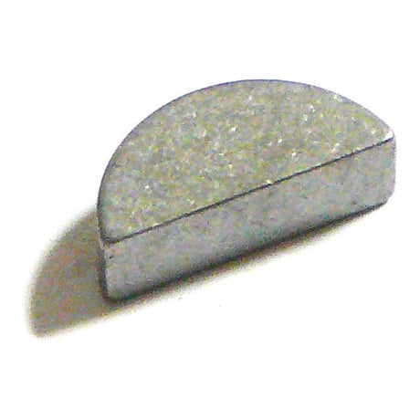 Close-up of a semicircular, silver metallic object against a white background, resembling an Imperial Woodruff Key 5/16'' x 1'' (DIN 6888) from Sparex, part number S.2920.