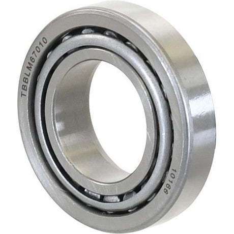 A close-up view of a silver Sparex Taper Roller Bearing (LM67048/67010) - S.2975 with the engraving "TBBLM67010" visible on the outer ring, providing crucial information about its manufacture.