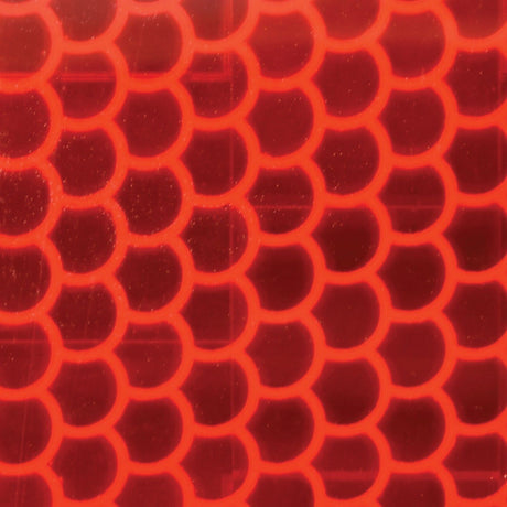 Close-up of the Red Conspicuity Tape by Sparex, featuring a honeycomb-like pattern with hexagonal shapes on a translucent background. This 50mm x 12.5m tape is ideal for providing manufacturing information or other informational needs. Product code: S.29766.