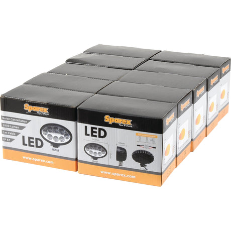 Boxes of Sparex LED Work Lights are neatly arranged in two rows. The packaging highlights features such as an IP69K rating, Class 3 noise cancellation, and 2400 lumens brightness.